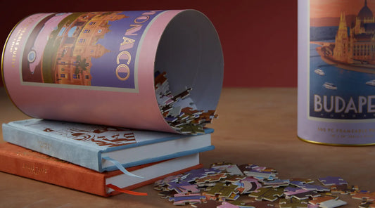 DesignWorks Ink Anderson Design Group Puzzles being tipped over