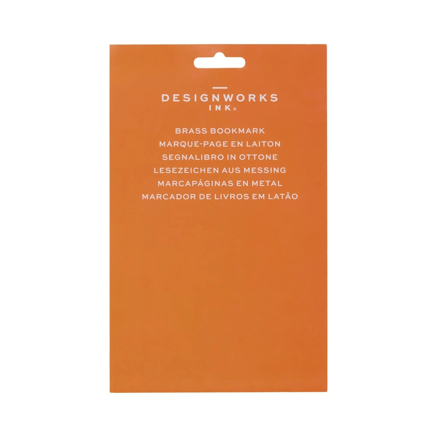 Orange packaging featuring the DesignWorks Ink logo and Brass Bookmark in six languages offers a sophisticated addition to your bookmarks collection, though images of the Brass Bookmark - Cherries are not shown.