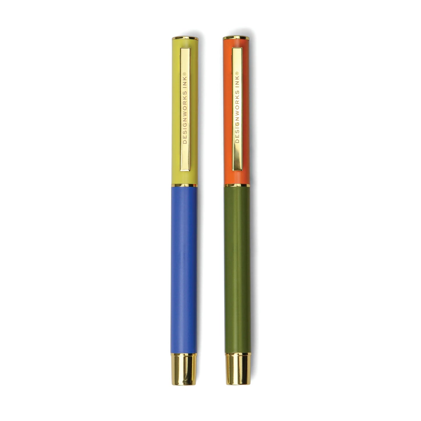 The Color Block Pens set includes two matte-finish metal ink pens with gold accents: one in cobalt blue with a yellow cap, and the other in army green with an orange cap, both standing upright for a stylish touch.