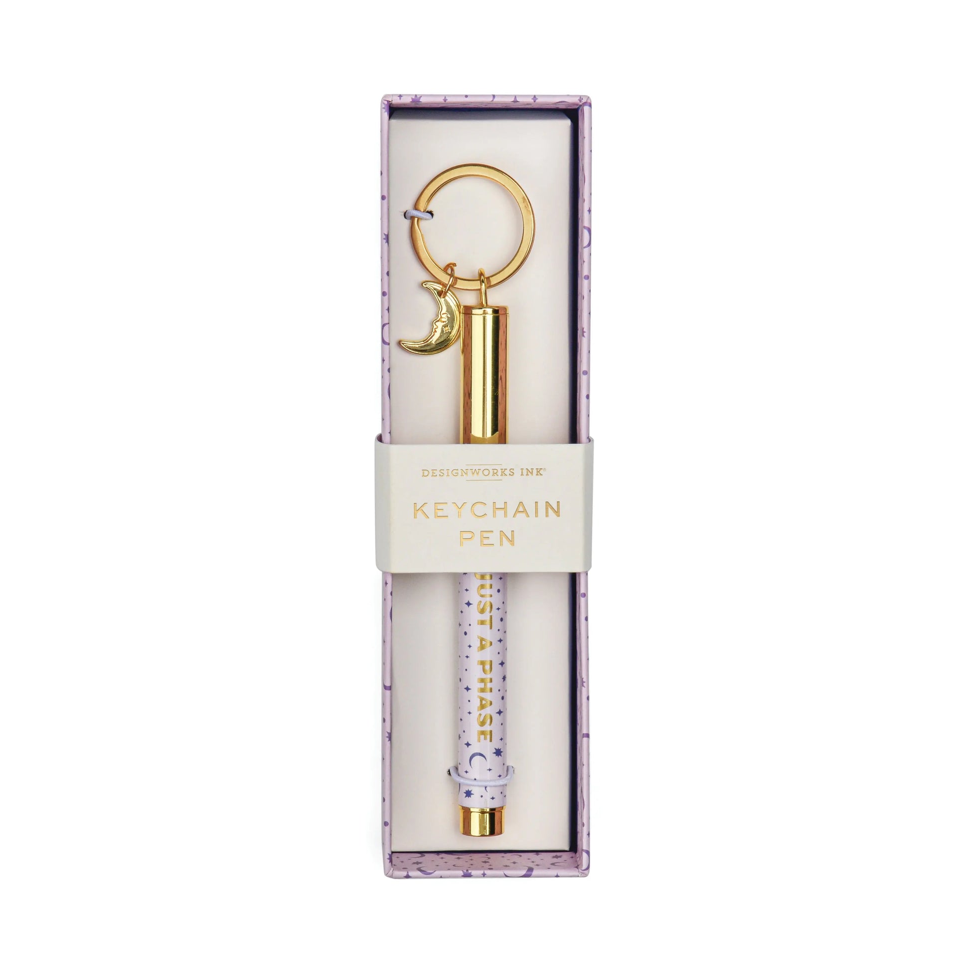 The Pen Keychain - Just a phase features a gold and white pen with a moon charm, gold sentiment, and comes in a decorative box labeled by DesignWorks Ink—perfect for those who love stylish, compact ink pens.