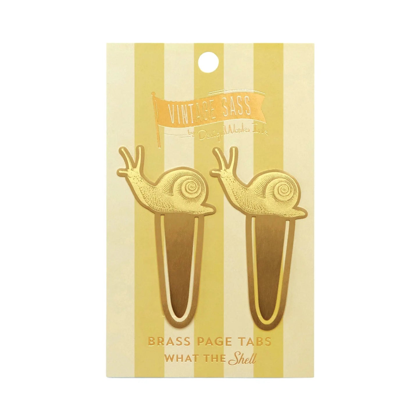 Two flexible brass, snail-shaped page tabs with a modern gold finish are attached to a yellow and white striped card labeled Vintage Sass Brass Page Tabs - What the Shell.