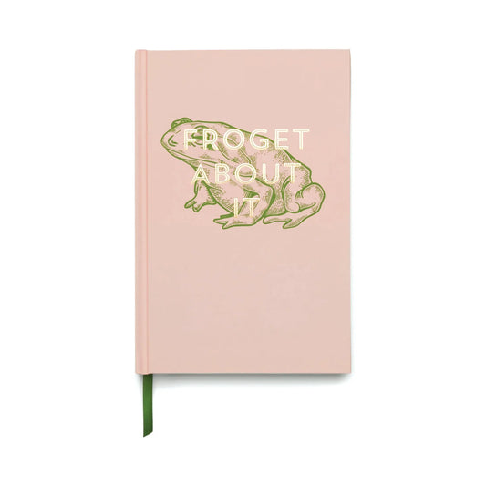The Vintage Sass Journal - Froget about it is a pink hardcover notebook featuring a frog illustration, the words FROGET ABOUT IT on the cover, and includes a green ribbon bookmark.