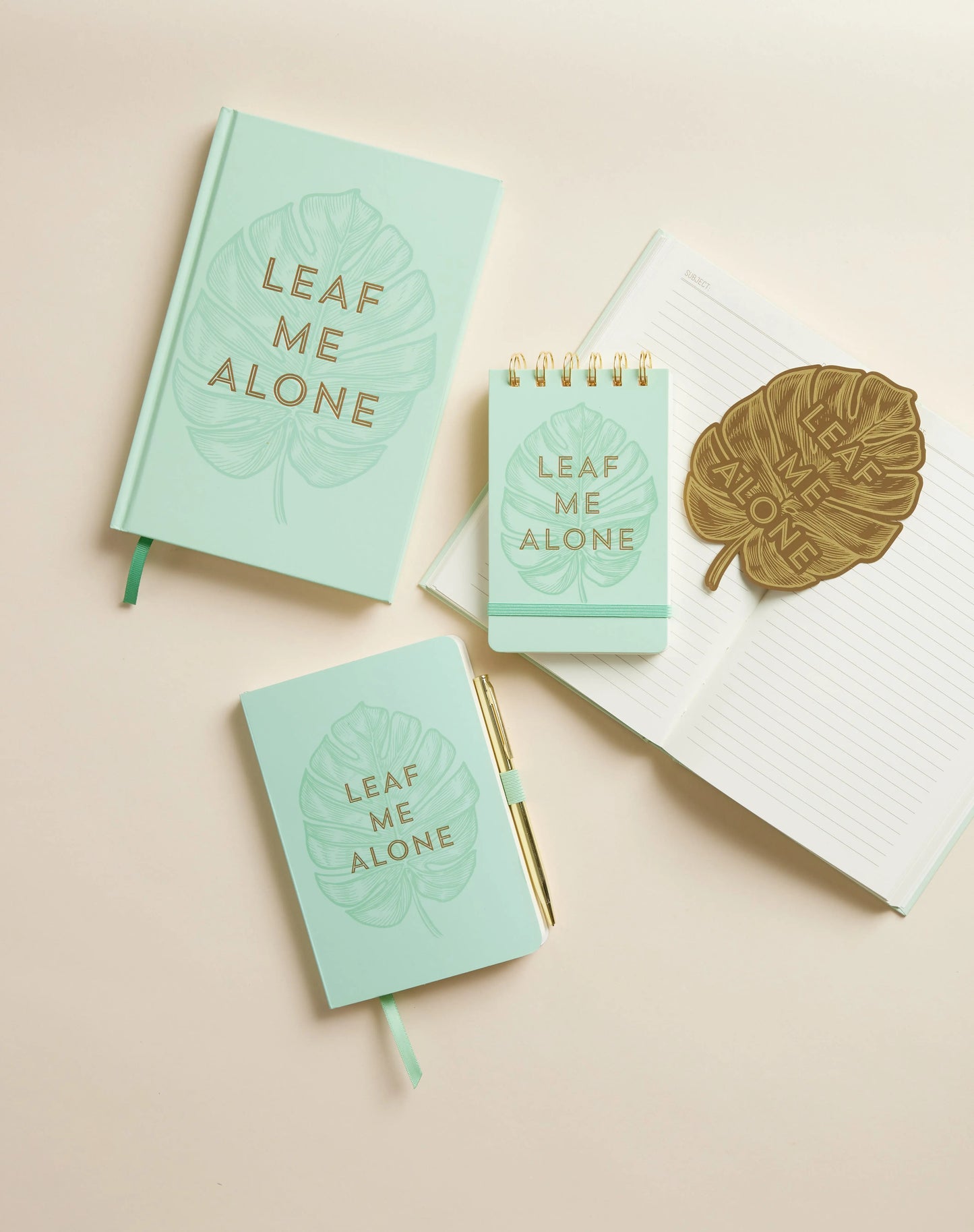 The Vintage Sass Notebook with Pen - Leaf Me Alone features a unique leaf-inspired design and sassy phrase, making it perfect for note-taking or journaling.