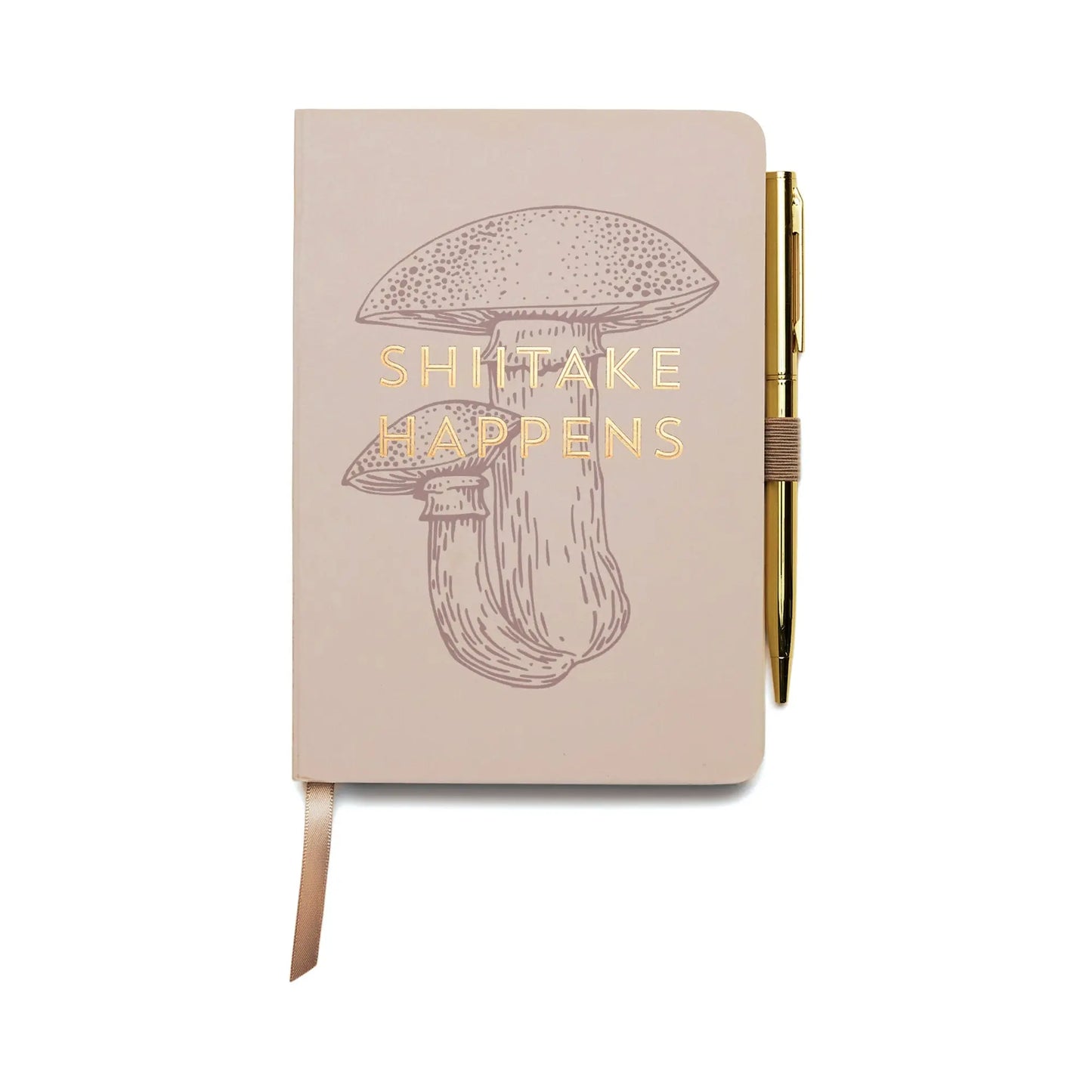 The Vintage Sass Notebook with Pen - Shittake Happens features a beige cover with a mushroom illustration, the gold-embossed phrase “SHIITAKE HAPPENS,” and comes with a sleek gold pen attached to the side.