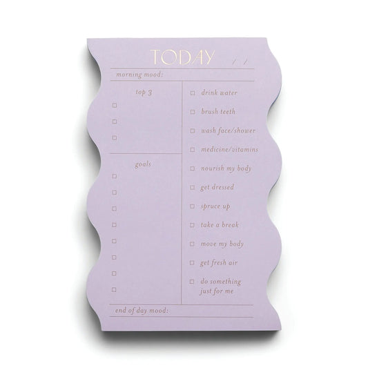 Stay organized and centered with the Wavy Daily Notepad - Lilac, featuring sections for morning and evening mood, top 3 goals, and a self-care checklist to support your daily routine.