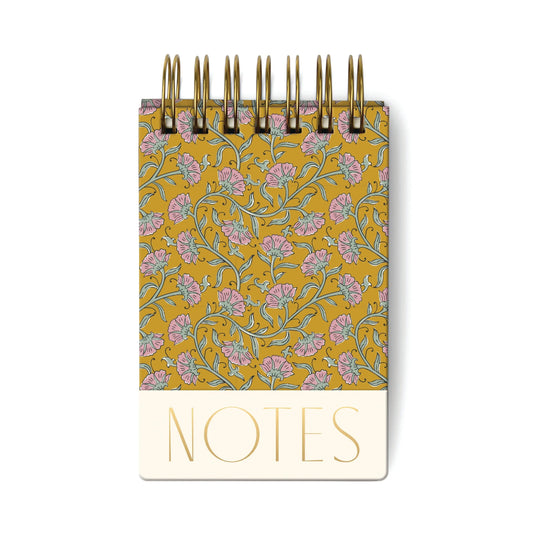 The Chunky Notepad - Gold Vintage Floral features a hard cover with a yellow floral design and NOTES printed in bold gold letters at the bottom.