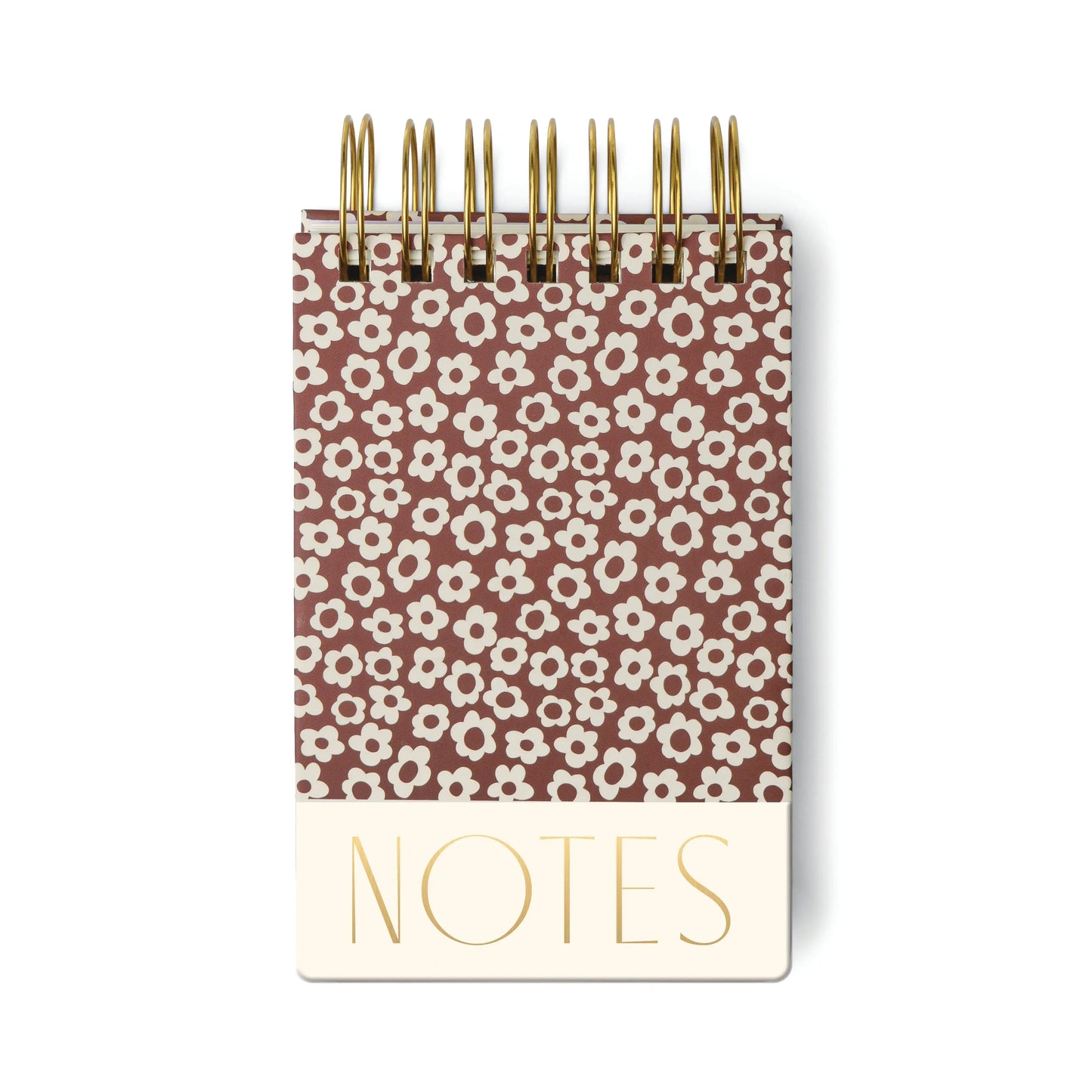 A chunky notepad with a burgundy cover featuring a groovy floral design and the words NOTES printed in large gold letters at the bottom.