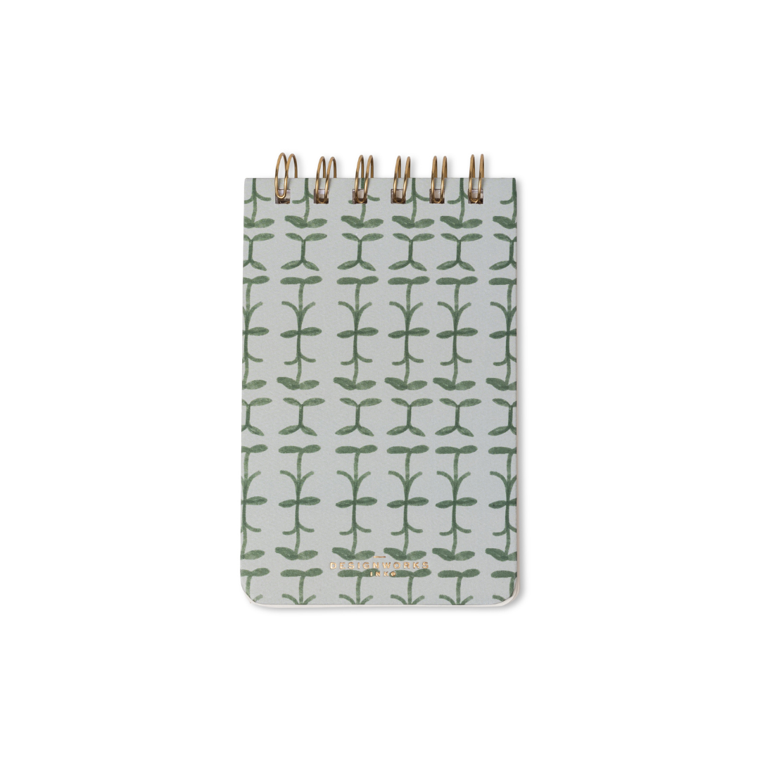 The Tulip Twin Wire Notepad - Green Vine is a small notepad with a white cover featuring a repeating green vine pattern, centered on a plain white background.