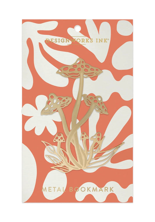 gold colored metal bookmark in the shape of a mushroom cluster