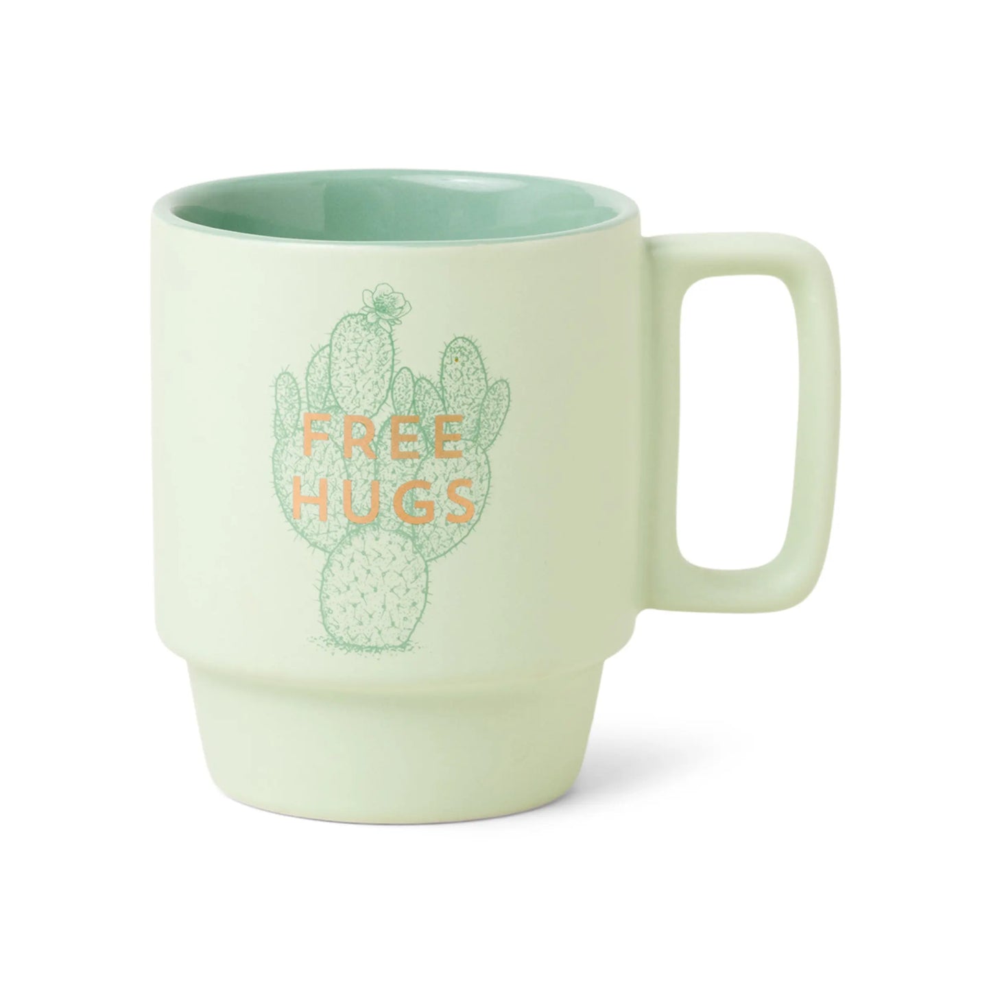 The Vintage Sass 12 oz. Mug - Free Hugs is a light green ceramic mug with a cactus botanical illustration and FREE HUGS printed on the front.