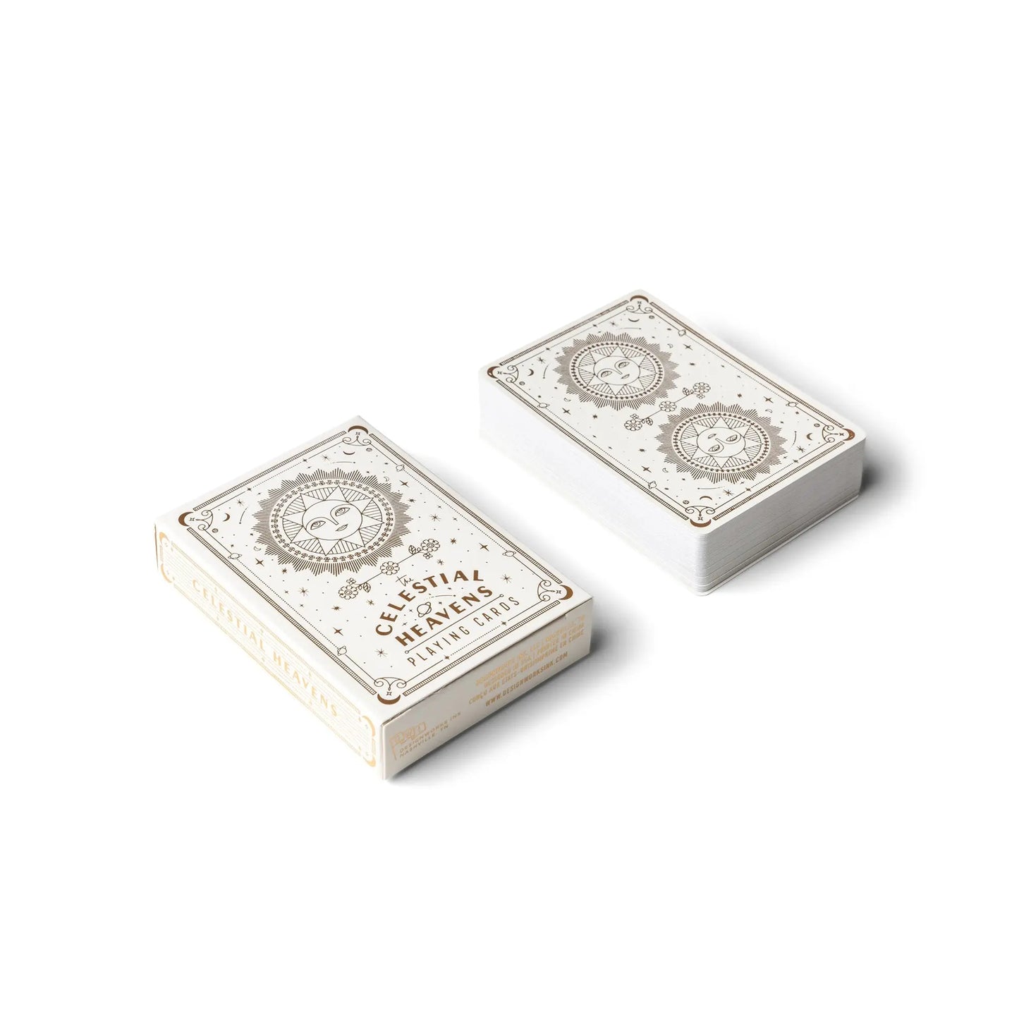 A box labeled Playing Cards - Celestial Heavens sits beside custom cards, both adorned with sun and moon motifs and elegant gold foil accents on a white background.