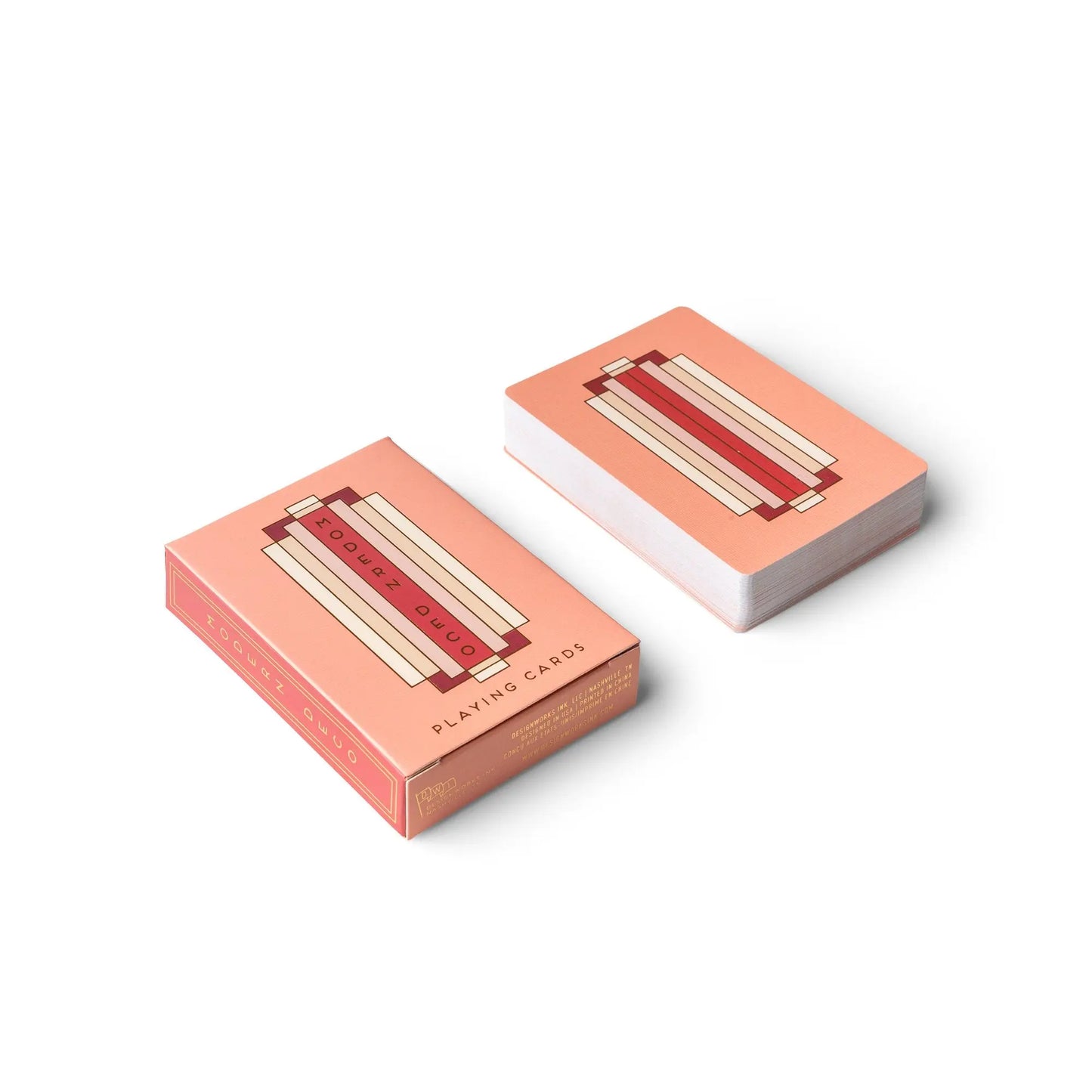 Playing Cards - Modern Deco: Custom deck and box with red, pink, and beige geometric rectangles on a light pink background. The box features elegant gold foil stamping for a luxurious touch.