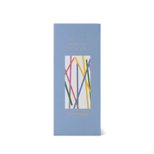A blue rectangular box labeled Library of Games - Pick Up Sticks features a window revealing colorful red, yellow, green, and blue sticks—a Timeless Classics favorite, perfect for Game Night fun.