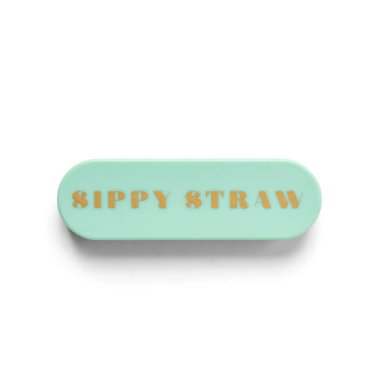 The Portable Straw - Sippy Straw is a mint green oval eco storage case with SIPPY STRAW in gold on top, ideal for carrying reusable stainless steel straws.
