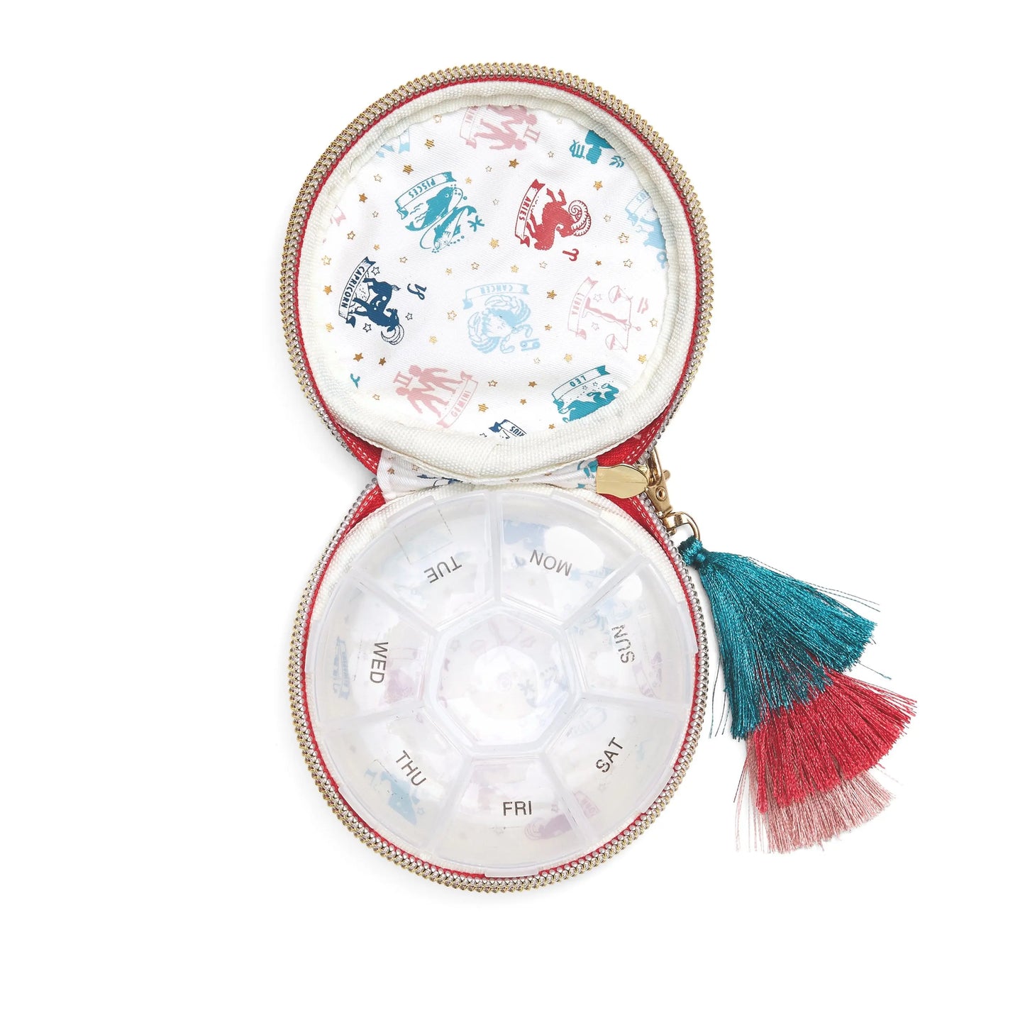 The Daily Vital-Mins Vegan Leather Travel Pill Case features round compartments for each day of the week, a colorful animal print lining, and a red and teal tassel zipper pull.