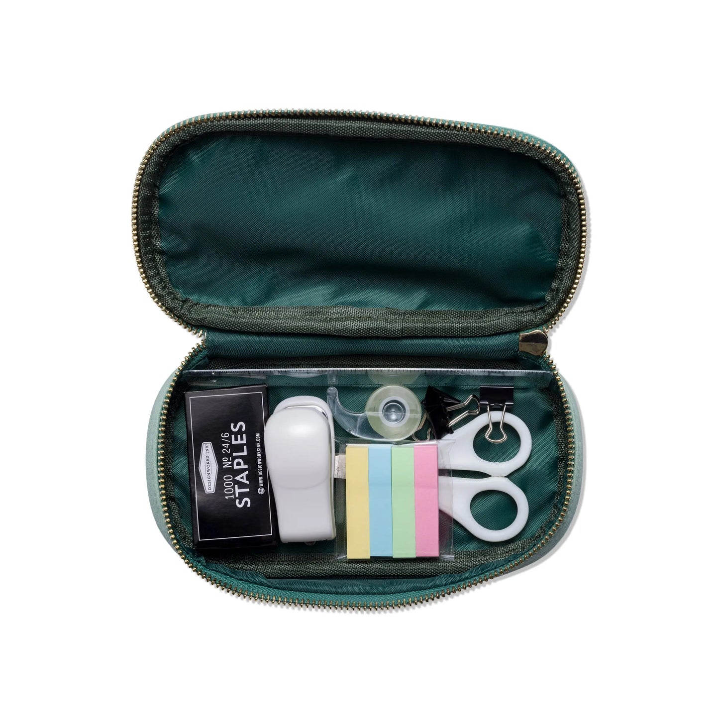 The Office On The Go - Matcha + Forest is a small green vegan leather zippered pouch that includes a box of staples, a tape dispenser, sticky notes, scissors, and a stapler for a neatly organized portable office kit.