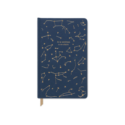 The Cloth Journal - Navy Constellations It Is Written In The Stars features lined pages, lay-flat binding, a gold ribbon bookmark, and a navy cover with gold constellation patterns and the phrase on the front.