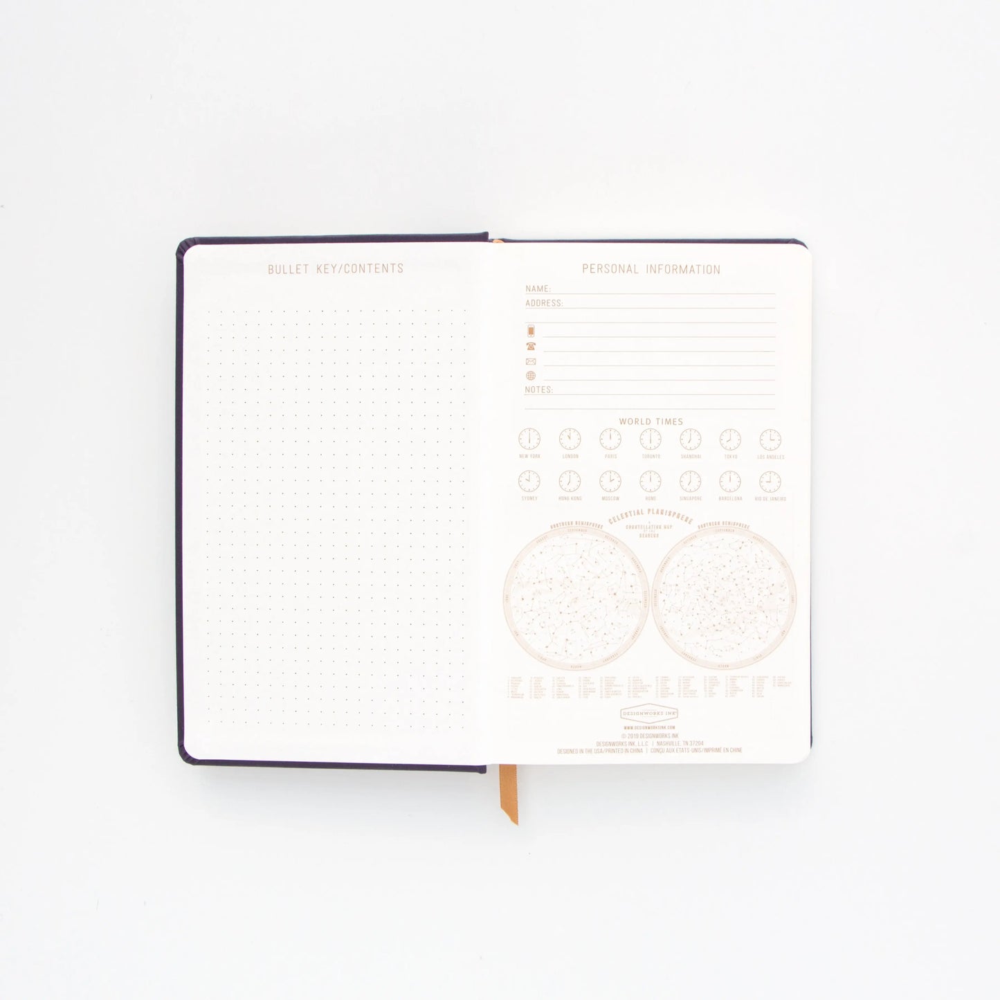 The Cloth Journal - Moon Phases features lay-flat binding with a dotted page on the left and a personal info form plus world time zones and hemisphere maps on the right.