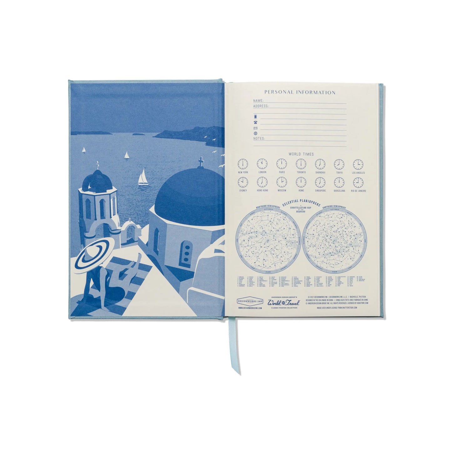An open Anderson Design Journal - Santorini shows a blue vintage poster-style illustration of a coastal town with domed buildings on the left, and on the right, a personal info page with world times and celestial charts.