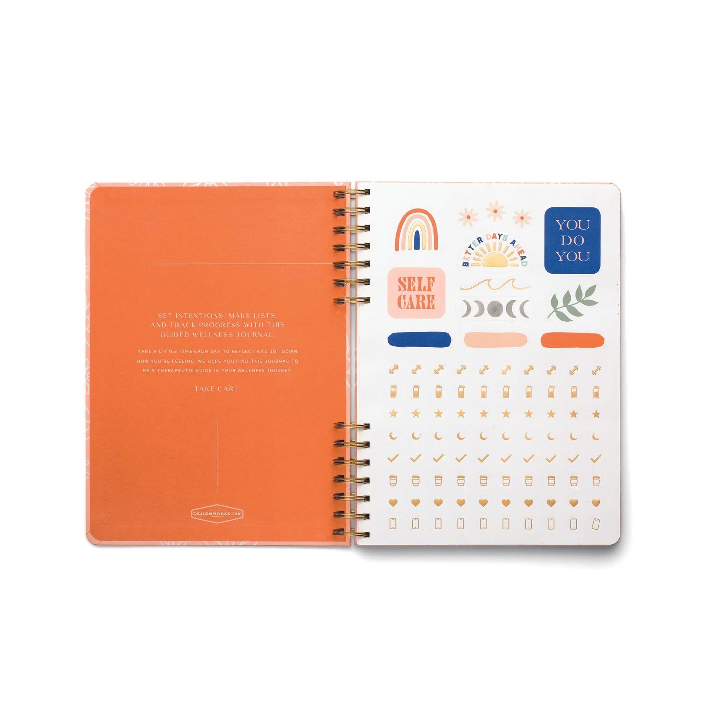 The Guided Wellness Journal - Take Care features an open spiral design with an orange left page of prompts and a right page of vibrant stickers—rainbows, stars, moons, and uplifting phrases—ideal for self care or gratitude practices.