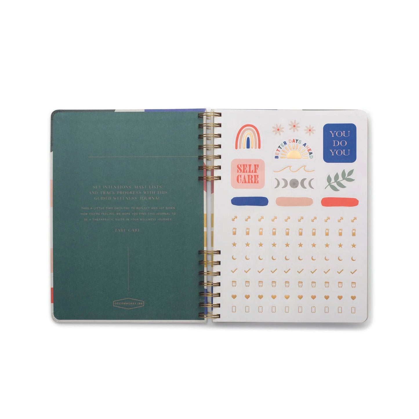 An open spiral-bound Guided Wellness Journal – Come As You Are shows a green left page with text and a right page of colorful self-care journey stickers, ideal for gratitude practice and personal wellness.