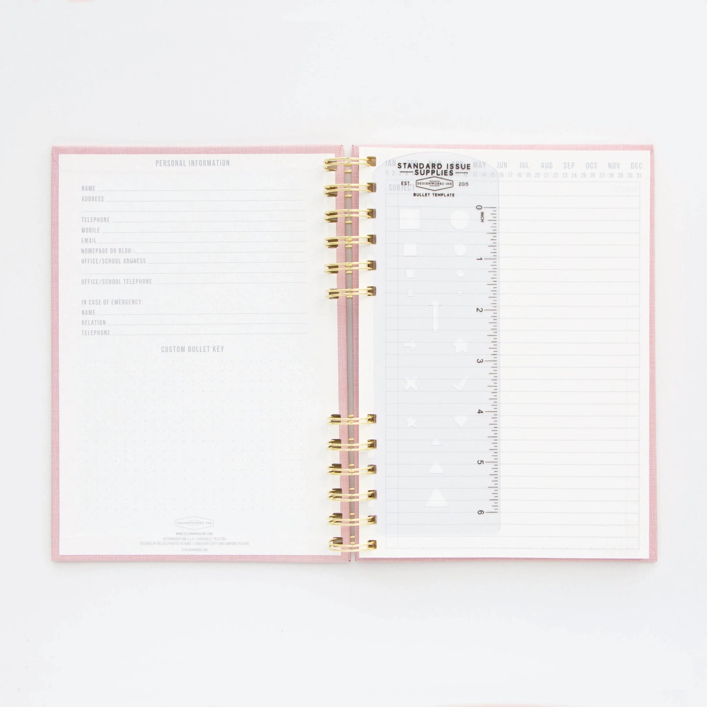 The Standard Issue Notebook No.12 - Dusty Pink is an open spiral-bound planner with high-quality construction, featuring a personal info page, lined notes page, and transparent ruler bookmark—ideal for anyone seeking a premium writing experience.