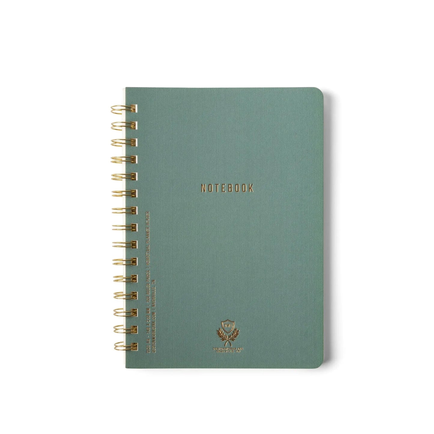 The Textured Paper Twin Wire Notebook - Medium Juniper is a green, spiral-bound notebook with gold NOTEBOOK lettering, a small emblem on the lower front cover, and a flexible soft cover, shown on a white background.