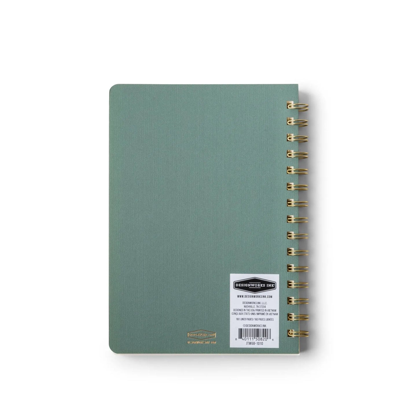 The Textured Paper Twin Wire Notebook - Medium Juniper features a flexible green textured soft cover with a white label showing text and a barcode, displayed on a white background.