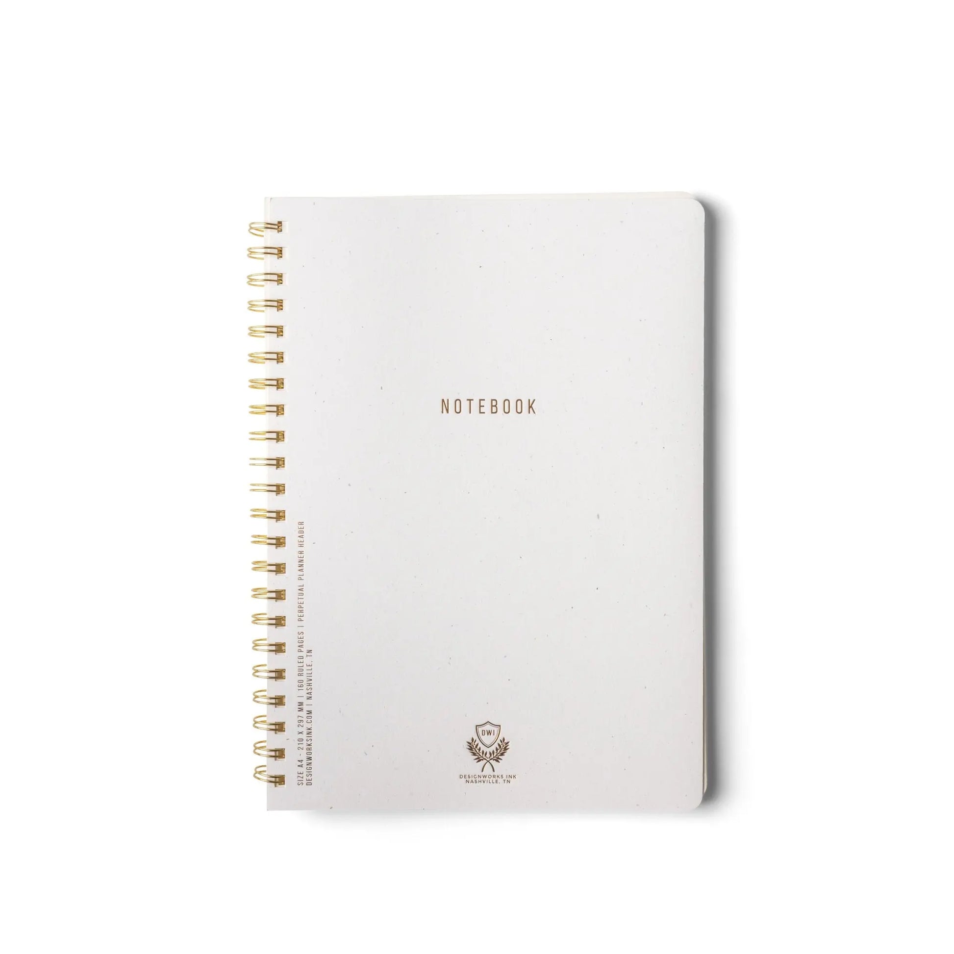 A large Textured Paper Twin Wire Notebook in speckled ivory with a softcover and gold NOTEBOOK lettering is displayed on a plain white background.