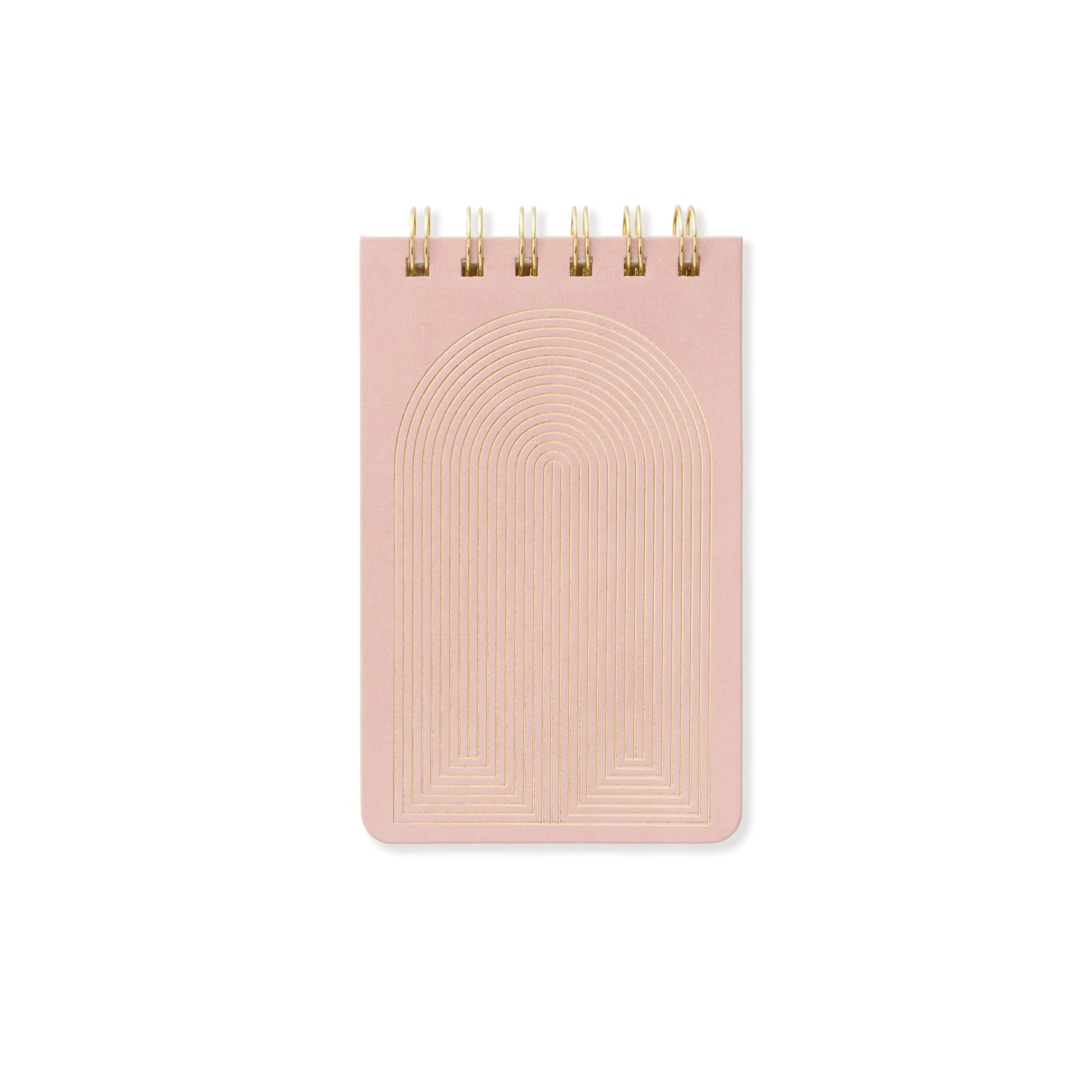 The Suede Cloth Covered Notepad - Radiant Rainbow is a small, spiral-bound notepad in Dusty Blush with a pale pink suede cover embossed with a geometric arch pattern, shown photographed on a white background.