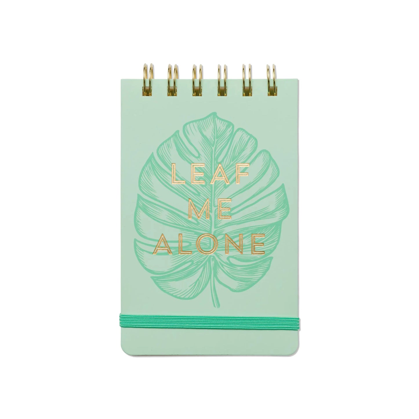 The Vintage Sass Notepad - Leaf Me Alone features a green spiral binding, a bold leaf design, gold LEAF ME ALONE text, and a green elastic band—a perfect pick for plant lovers with vintage flair.