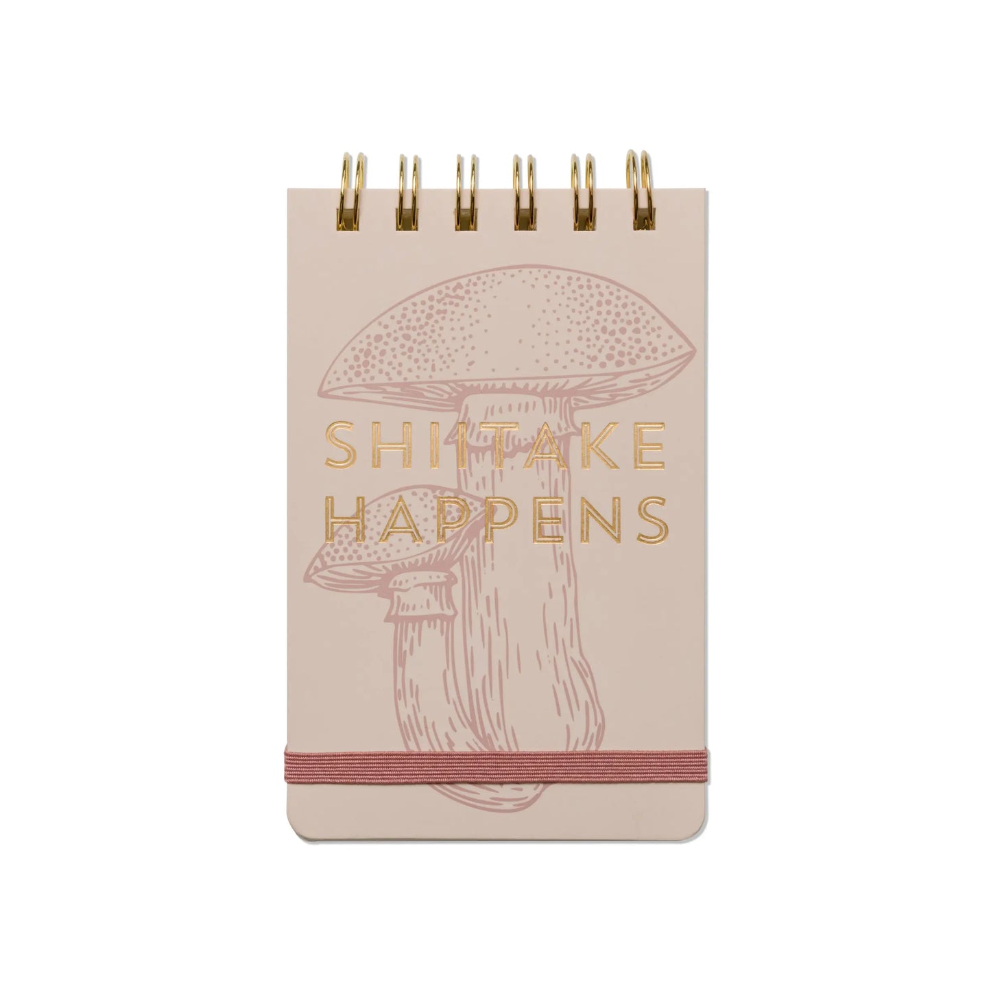 The Vintage Sass Notepad - Shiitake Happens features a beige cover with quirky shiitake mushroom art, gold SHIITAKE HAPPENS text, and a handy elastic band—perfect gift for any mushroom lover.