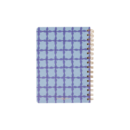 The Tulip Twin Wire Notebook - Small Blue Lattice has a light blue cover with a geometric lattice pattern, lined perforated pages, and right-side twin-wire binding, all set against a white background.