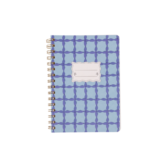 The Tulip Twin Wire Notebook - Small Blue Lattice features a blue and purple geometric cover with a blank center label for personalization, twin-wire binding, and lined perforated pages for easy note-taking and clean tear-out.