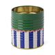 The A Dopo Solid & Striped Storage Tin features a green lid, gold interior, and blue-and-white stripes trimmed with a pink wavy line—perfect for adding Mediterranean-inspired charm to any whimsical collection.