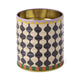 The A Dopo Black & White Wavy Storage Tin is a whimsical cylindrical metal container with a gold interior and a Mediterranean-inspired exterior featuring black waves, yellow triangles, and green, red, and orange stripes at the base.