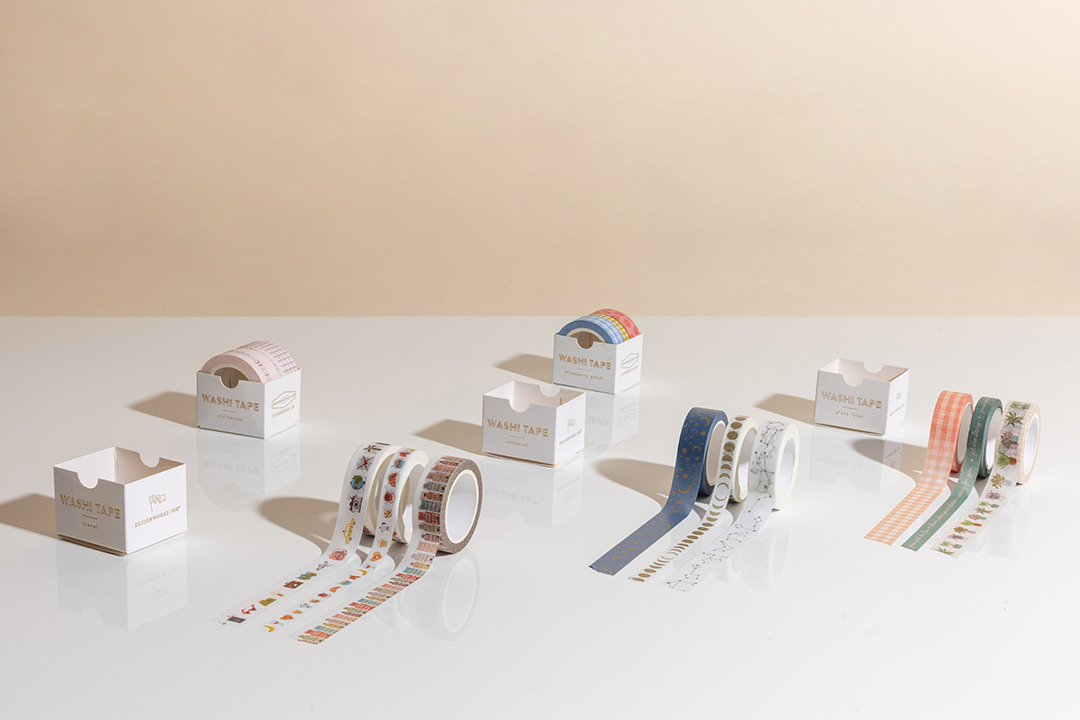 5 different washi tape trios on a white table with a nude background
