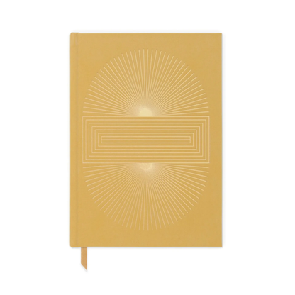 The Radiant Journal - Suns Block is a mustard yellow suede hardcover notebook featuring a gold geometric sunburst design and a matching ribbon bookmark, shown on a white background.