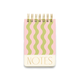 The Chunky Small Twin Wire Notepad - Wavy Stripes features a spiral binding, green and pink wavy striped cover, and "NOTES" in gold at the bottom.