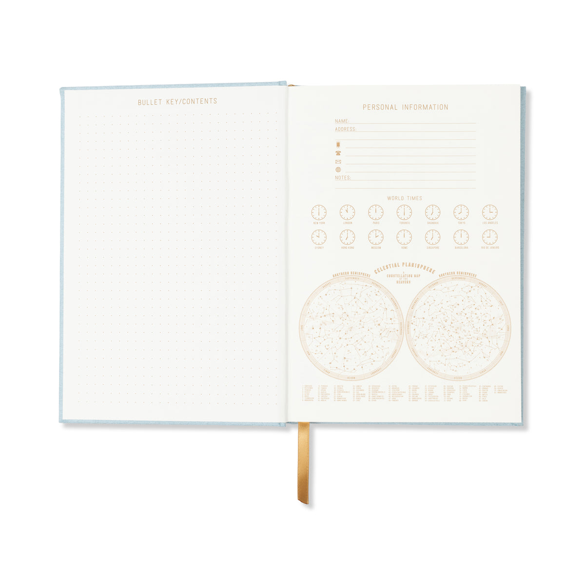 The Hard Cover Suede Cloth Journal With Pocket - Arch Dot in blue showcases a dotted page and a personal info page with world times, celestial pointers, and contact details. A gold ribbon bookmark adds elegance to this journal's stylish design.