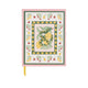 The A Dopo Snake Journal - 6 X 7.75 features a Mediterranean-inspired cover with two green snakes, lemons, and a cherry-lemon border, plus a yellow ribbon bookmark for extra charm.