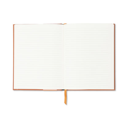 An open A Dopo Tiger Journal with lay-flat binding, a brown cover, and an orange ribbon bookmark rests on a white surface. Its lined pages are blank and ready for documenting your Mediterranean journeys.