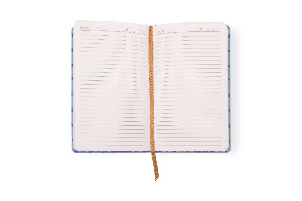 The Tulip Journal - Blue Lattice is an open, lay-flat botanical journal with lined pages, a brown ribbon bookmark, and headers for Subject and Date at the top of each page—perfect for your writing needs.