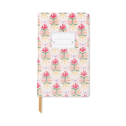 The Tulip Journal - Tropical features a pink, green, and orange botanical cover, a central rectangular label area, and a gold ribbon bookmark—perfect for capturing your thoughts in style.