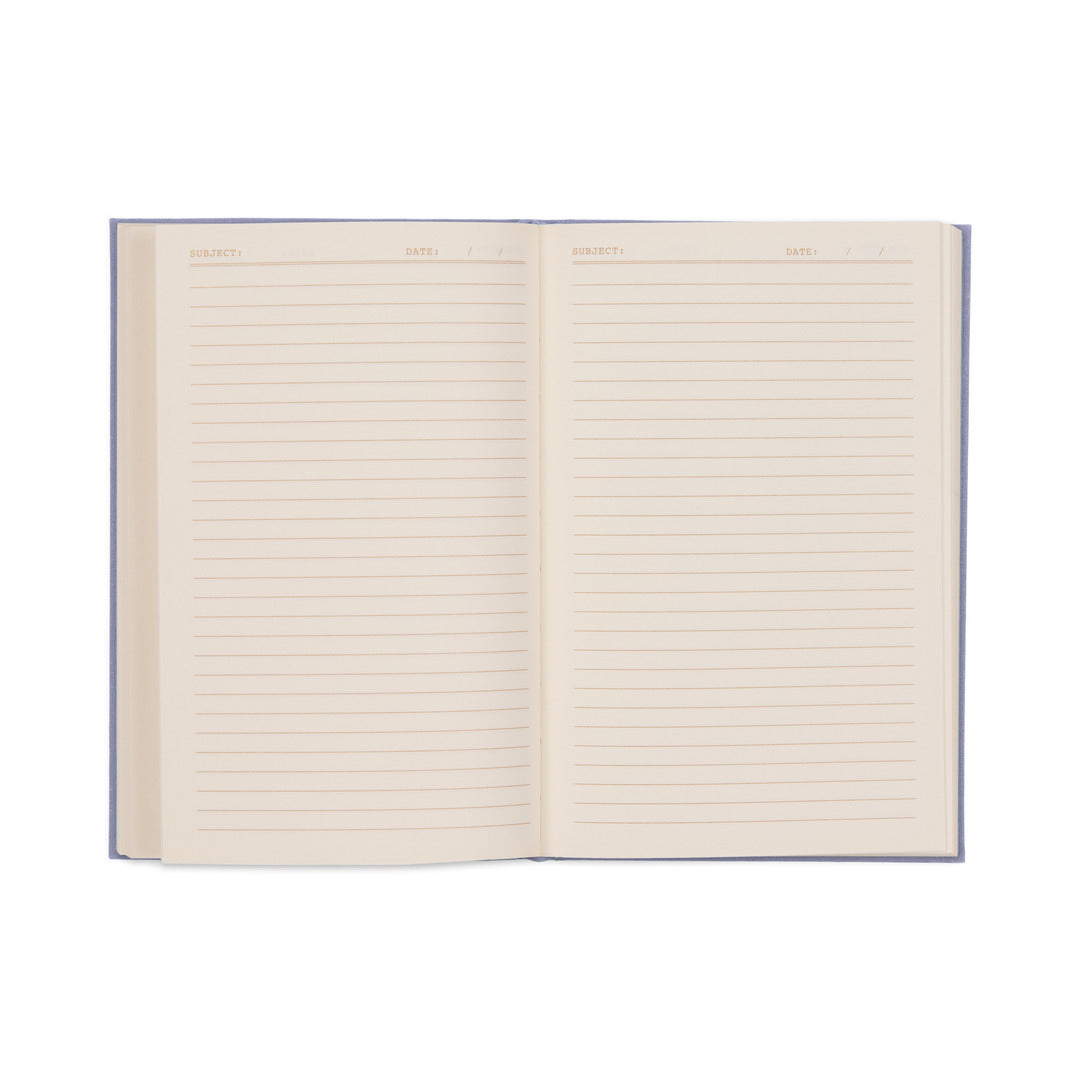 The Very Tired Woman Journal features an open notebook design with lined pages and a classic bookcloth cover. Each page includes fields at the top for Subject and Date, and its lay-flat binding ensures the blank pages are ready for your thoughts, making it perfect as a vintage book journal.