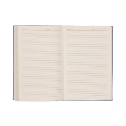 The Very Tired Woman Journal features an open notebook design with lined pages and a classic bookcloth cover. Each page includes fields at the top for Subject and Date, and its lay-flat binding ensures the blank pages are ready for your thoughts, making it perfect as a vintage book journal.