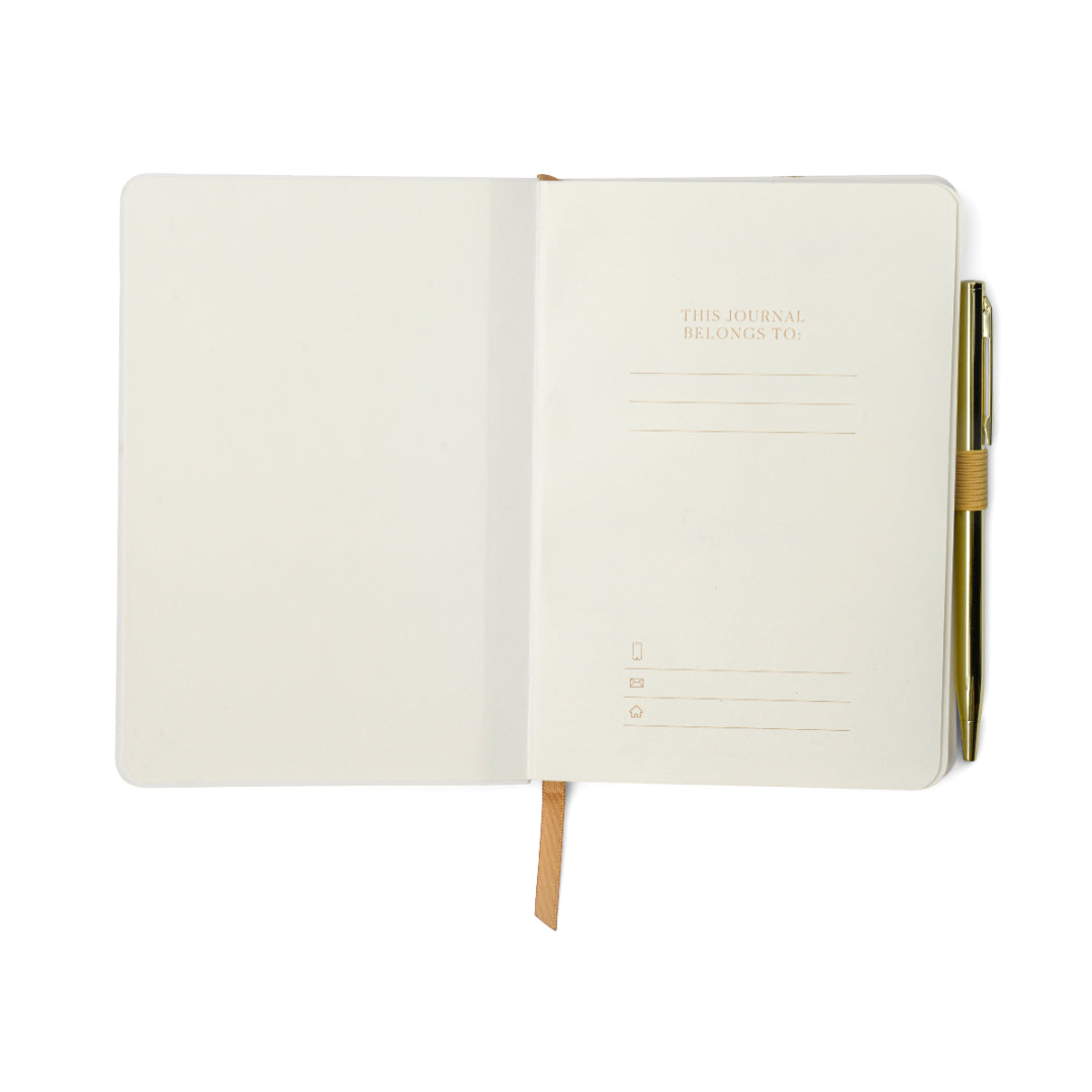 An open Gratitude Journal with Pen – Attitude of Gratitude featuring a ribbon bookmark and a pen held securely in a loop. The right page includes lined sections for writing your name and contact information, while the left page is blank—ideal for personal reflections or guided prompts on gratitude and mindfulness.