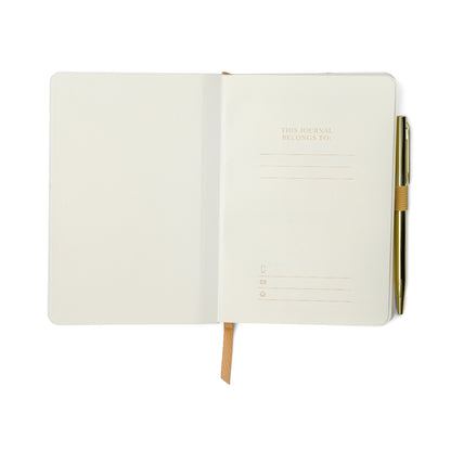 An open Gratitude Journal with Pen – Attitude of Gratitude featuring a ribbon bookmark and a pen held securely in a loop. The right page includes lined sections for writing your name and contact information, while the left page is blank—ideal for personal reflections or guided prompts on gratitude and mindfulness.
