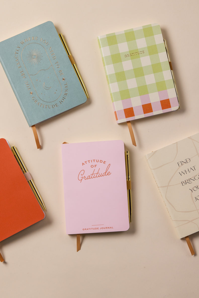 The "Gratitude Journal with Pen - You Are Exactly Where You Need To Be" features a colorful cover and pen, perfect for daily reflection and mindfulness. Its inviting design encourages you to practice gratitude each day.