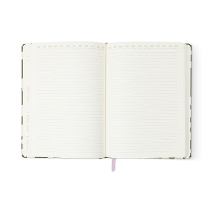 The Soft Touch Jumbo Journal - Green Groovy Floral is an oversized notebook with lined pages, a ribbon bookmark, two blank spreads with date sections, and a stylish green floral patterned cover for an elevated writing experience.